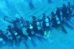 Guinness world record for the longest human chain underwater, Guinness world record, nri and team creates guinness world record, Scuba diver