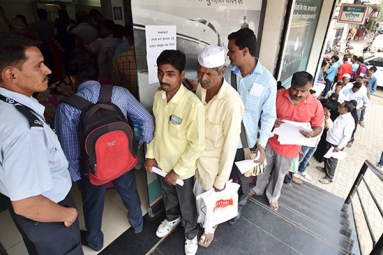 NRIs and PIOs Face Heat of Demonitization NRIs and PIOs Face Heat of Demonitization